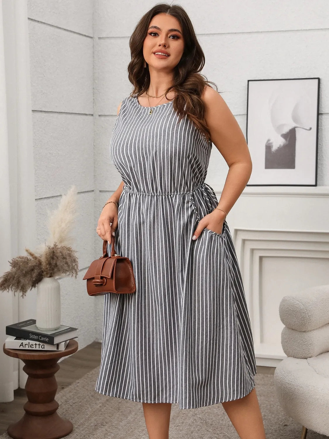 Plus Size Striped Round Neck Sleeveless Dress - Premium Dresses from Trendsi - Just $40.99! Shop now at Handbags Specialist Headquarter