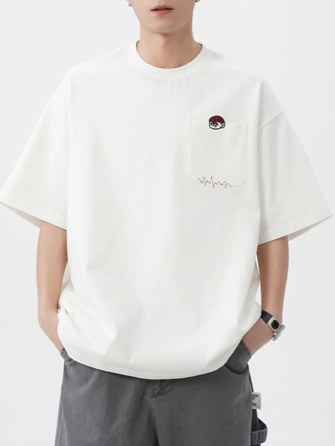 Men's Plus Size Round Neck Embroidered T-Shirt - Premium Men's T-Shirt from Trendsi - Just $30.99! Shop now at Handbags Specialist Headquarter