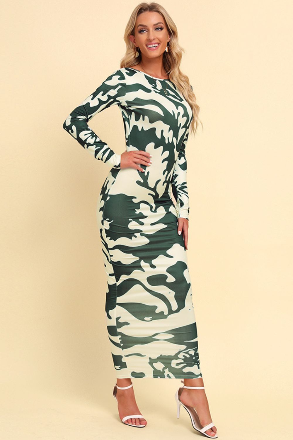Printed Backless Long Sleeve Maxi Dress - Premium Maxi Dress from Trendsi - Just $32.99! Shop now at Handbags Specialist Headquarter