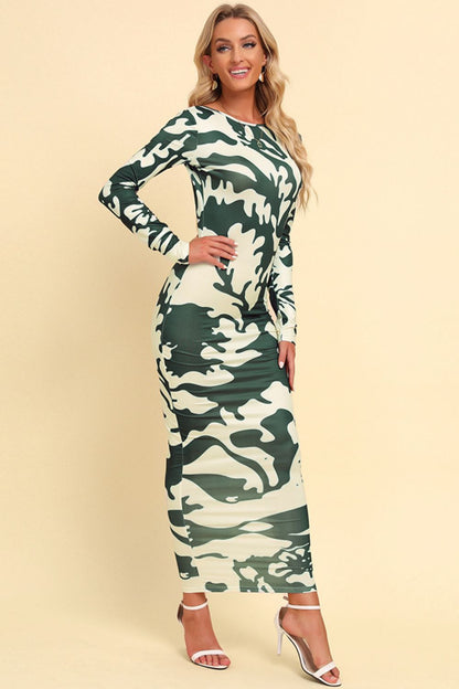 Printed Backless Long Sleeve Maxi Dress - Premium Maxi Dress from Trendsi - Just $32.99! Shop now at Handbags Specialist Headquarter