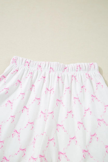 Bow Print Lettuce Trim Round Neck Top and Shorts Lounge Set - Premium Sleepwear from Trendsi - Just $32.14! Shop now at Handbags Specialist Headquarter