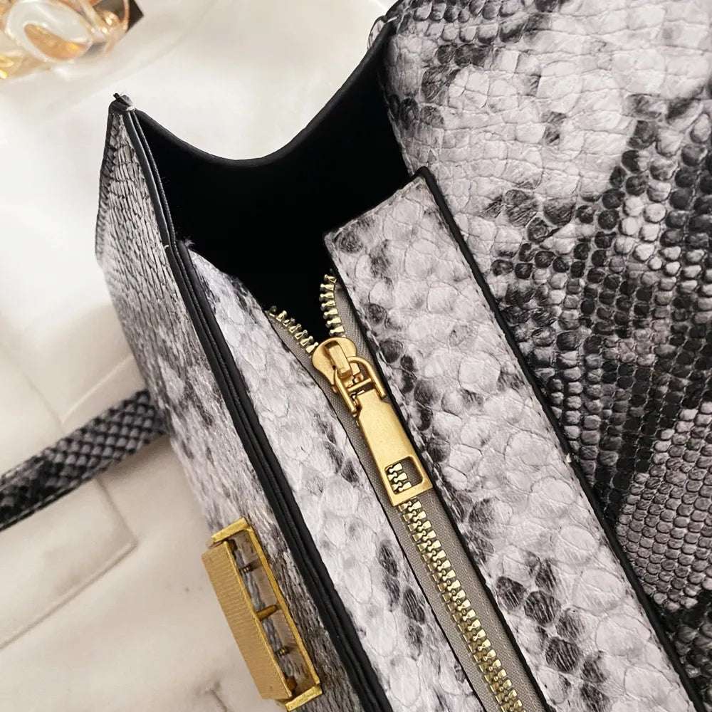 PU Leather Snakeskin Print Crossbody Bag - Premium Crossbody Bag from Trendsi - Just $35.99! Shop now at Handbags Specialist Headquarter