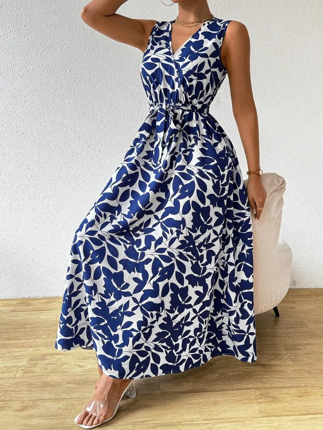 Printed Surplice Sleeveless Maxi Dress - Premium Maxi Dress from Trendsi - Just $43.99! Shop now at Handbags Specialist Headquarter