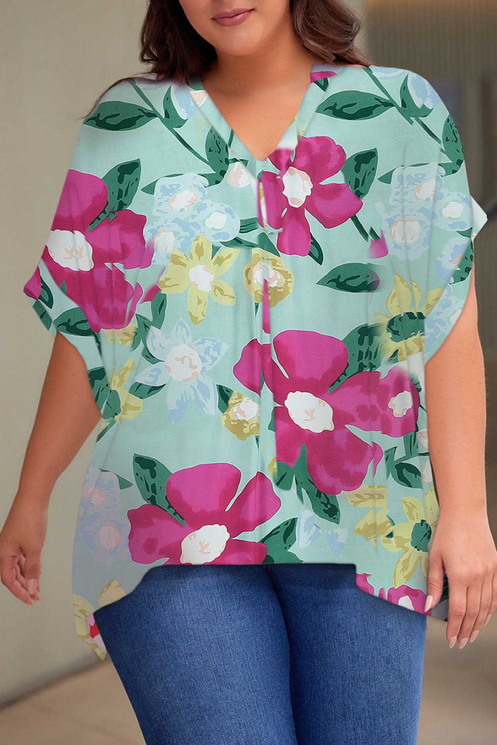 Plus Size Printed Notched Neck Half Sleeve Top - Premium Plus Size Shirts from Trendsi - Just $28! Shop now at Handbags Specialist Headquarter