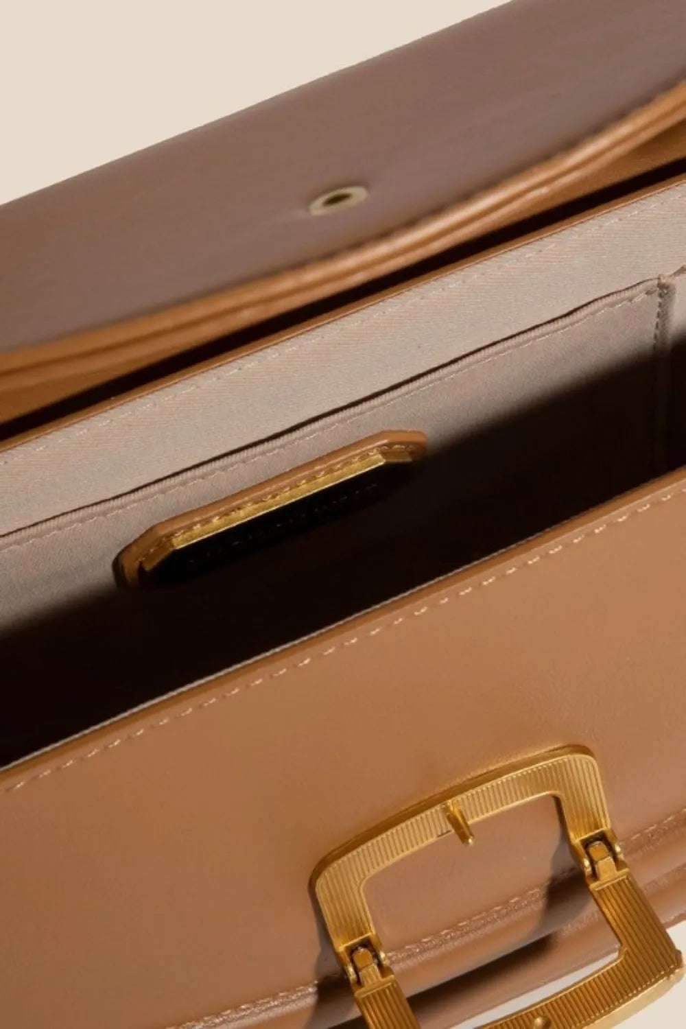 Fame Buckle Closure Crescent Faux Leather Crossbody Bag - Premium Crossbody Bag from Trendsi - Just $53.99! Shop now at Handbags Specialist Headquarter