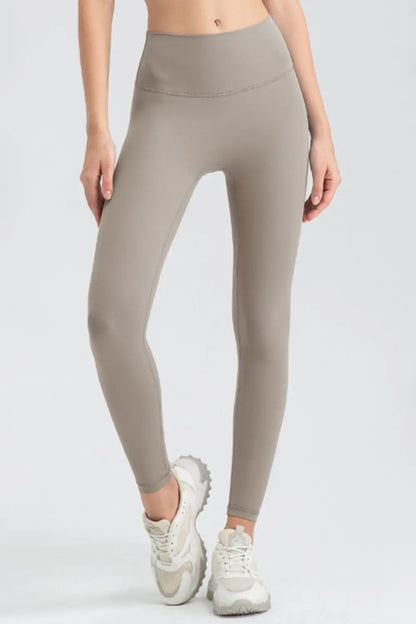 Wide Waistband Sport Leggings - Premium Leggings from Trendsi - Just $50.91! Shop now at Handbags Specialist Headquarter