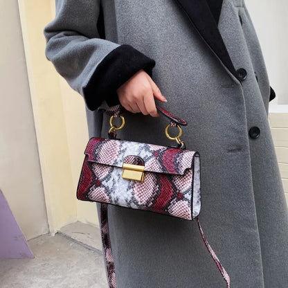 PU Leather Snakeskin Print Crossbody Bag - Premium Crossbody Bag from Trendsi - Just $35.99! Shop now at Handbags Specialist Headquarter