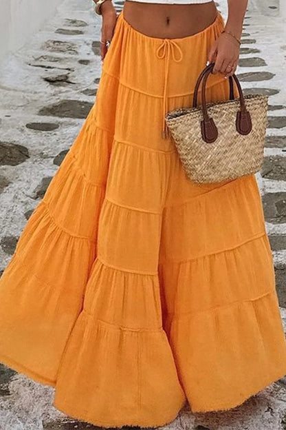 Bohemian Tiered Maxi Skirt with Drawstring Waist - Premium Skirts from Trendsi - Just $38.99! Shop now at Handbags Specialist Headquarter