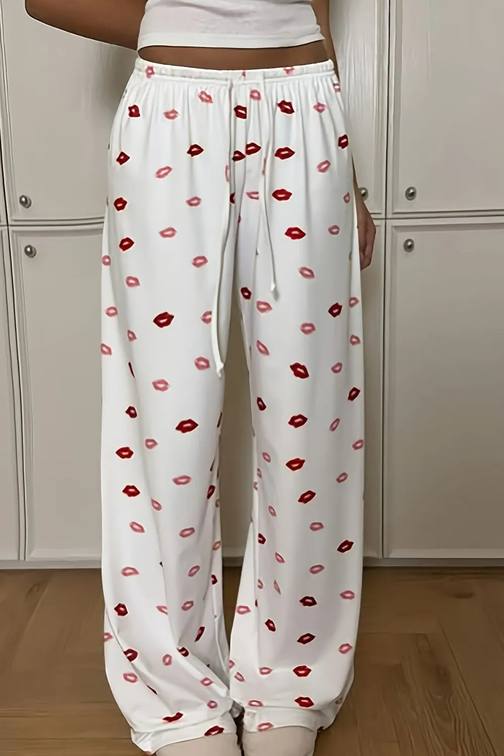 Lips Print Wide Leg Pants - Premium Women Pants from Trendsi - Just $22.99! Shop now at Handbags Specialist Headquarter