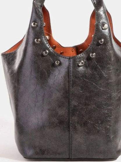Fame Weathered Faux Leather And Studs Bucket Bag - Premium Crossbody Bag from Trendsi - Just $25.99! Shop now at Handbags Specialist Headquarter