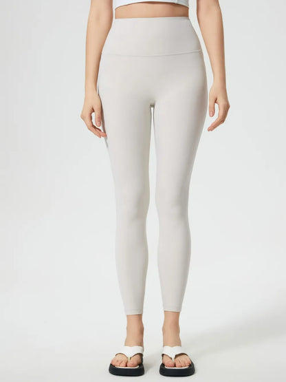 Millennia Wide Waistband Active Leggings - Premium Leggings from Trendsi - Just $40.95! Shop now at Handbags Specialist Headquarter