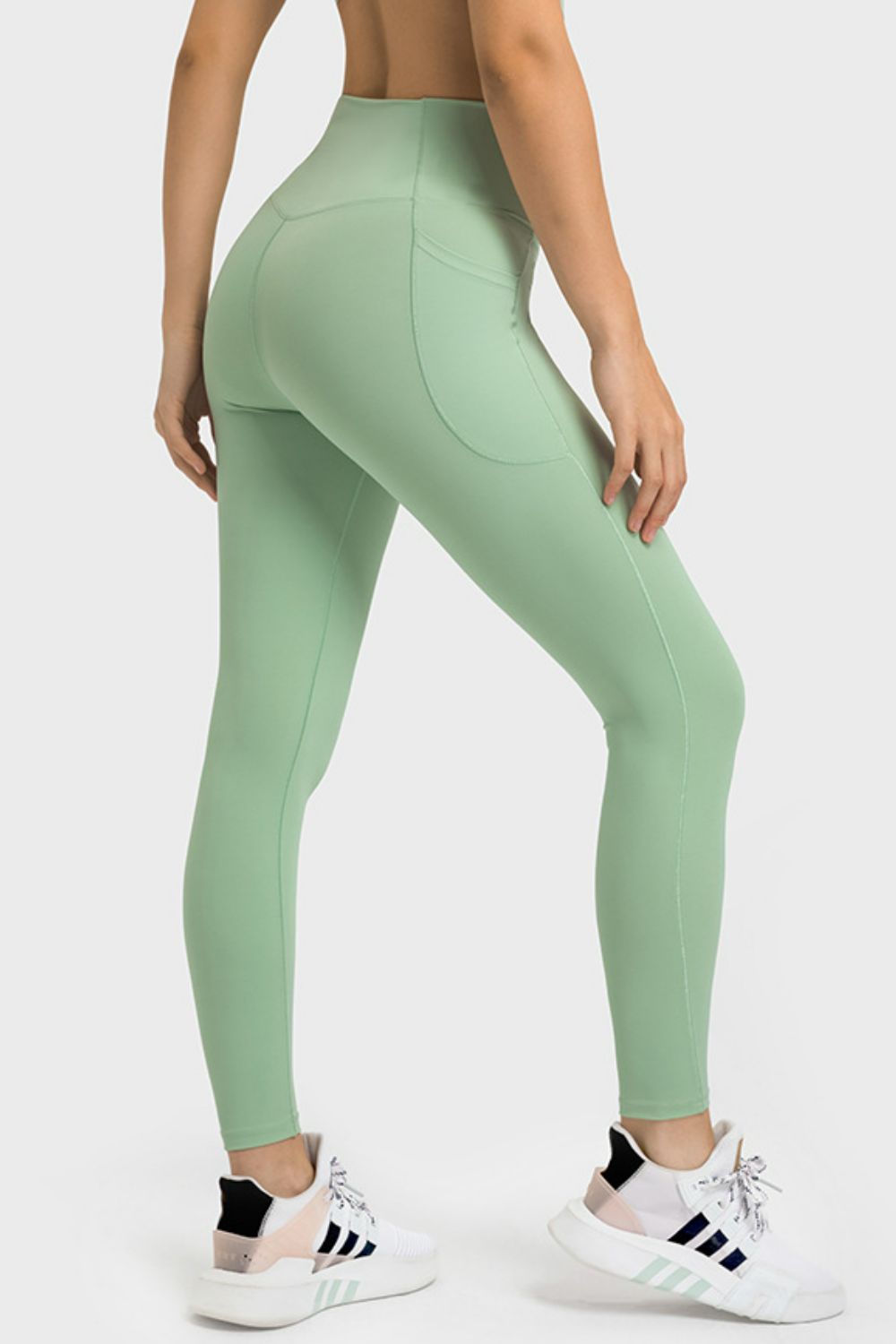 Millennia V-Waist Yoga Leggings with Pockets - Premium Leggings from Trendsi - Just $59.76! Shop now at Handbags Specialist Headquarter