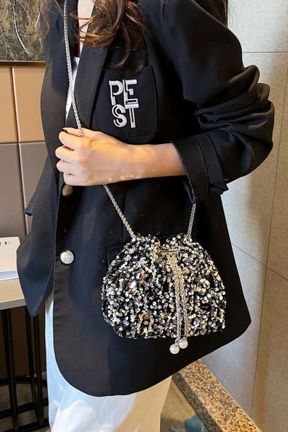 Sequin Chain Drawstring Bucket Bag - Premium Crossbody Bag from Trendsi - Just $21.99! Shop now at Handbags Specialist Headquarter