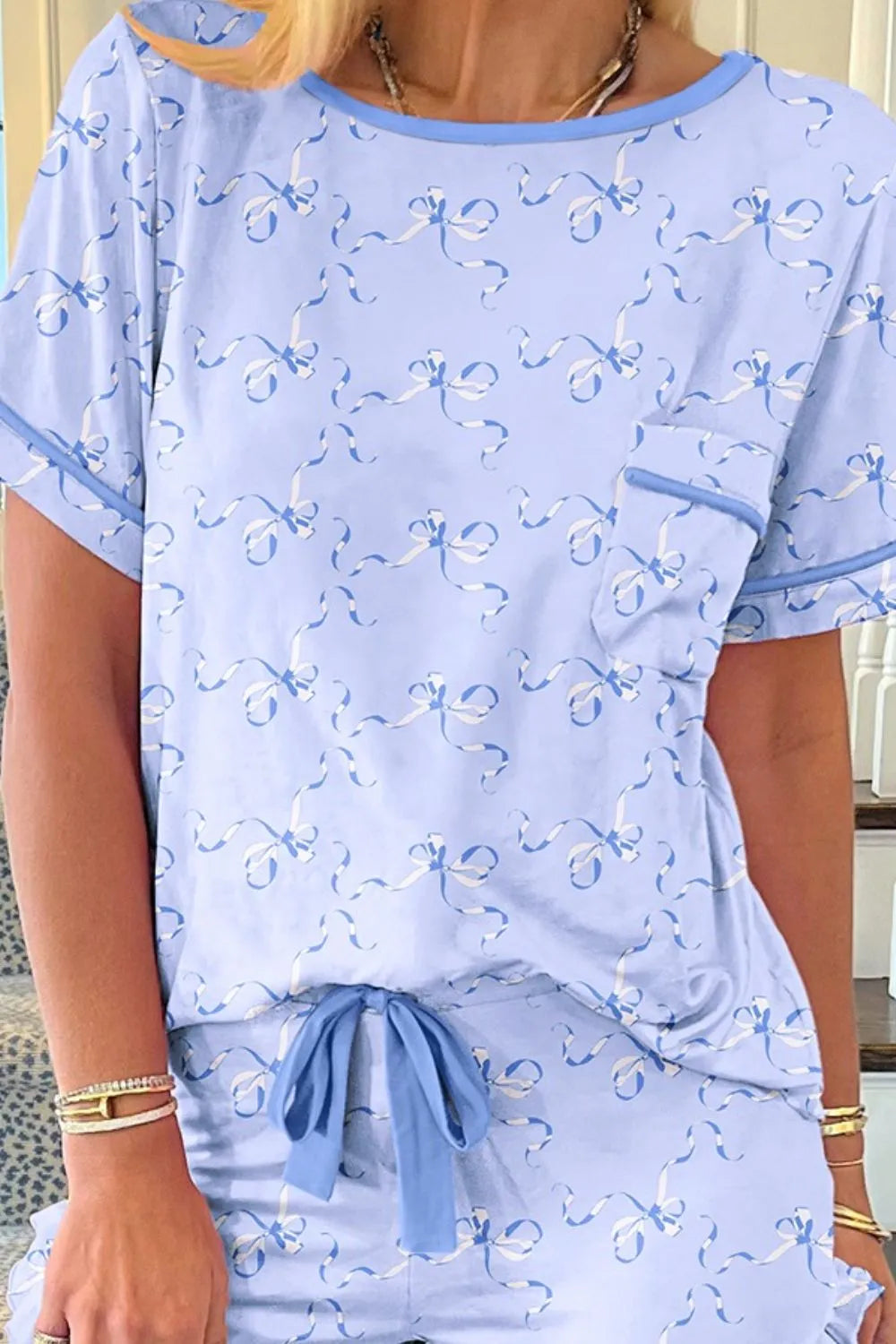 Bow Print Short Sleeve Top and Shorts Pajama Set - Premium Sleepwear from Trendsi - Just $39.99! Shop now at Handbags Specialist Headquarter