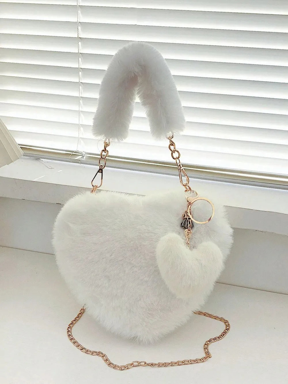 Heart Shape Faux Fur Handbag - Premium handbags from Trendsi - Just $19.99! Shop now at Handbags Specialist Headquarter