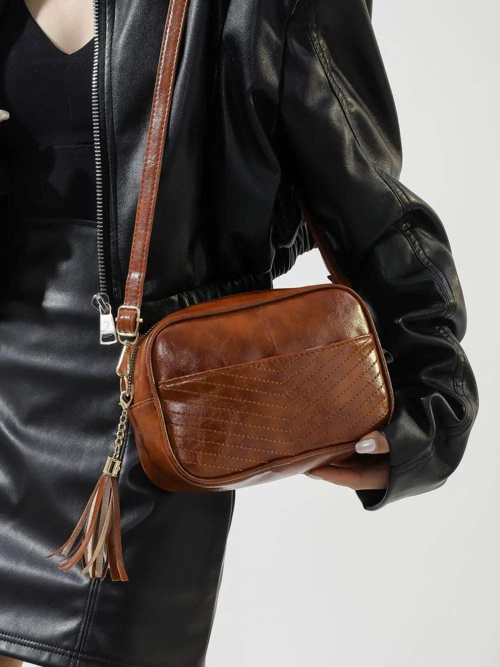 Tassel PU Leather Printed Strap Cassette Crossbody Bag - Premium Crossbody Bag from Trendsi - Just $22.99! Shop now at Handbags Specialist Headquarter