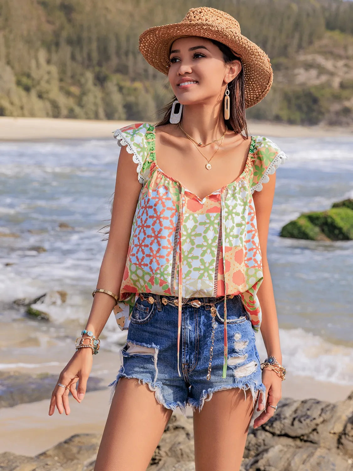 Lace Detail Printed Tie Neck Cap Sleeve Blouse - Premium Tops from Trendsi - Just $16.82! Shop now at Handbags Specialist Headquarter