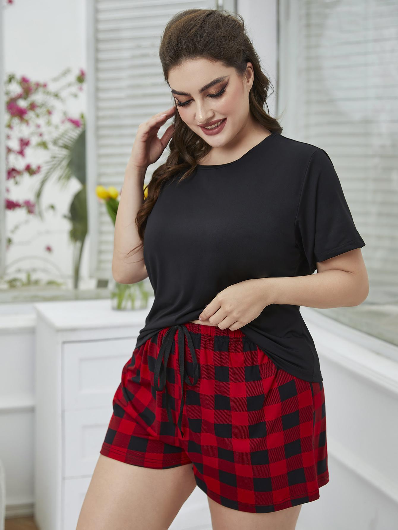 Plus Size Round Neck Tee Shirt and Plaid Shorts Lounge Set - Premium Plus Size Shirts from Trendsi - Just $28! Shop now at Handbags Specialist Headquarter