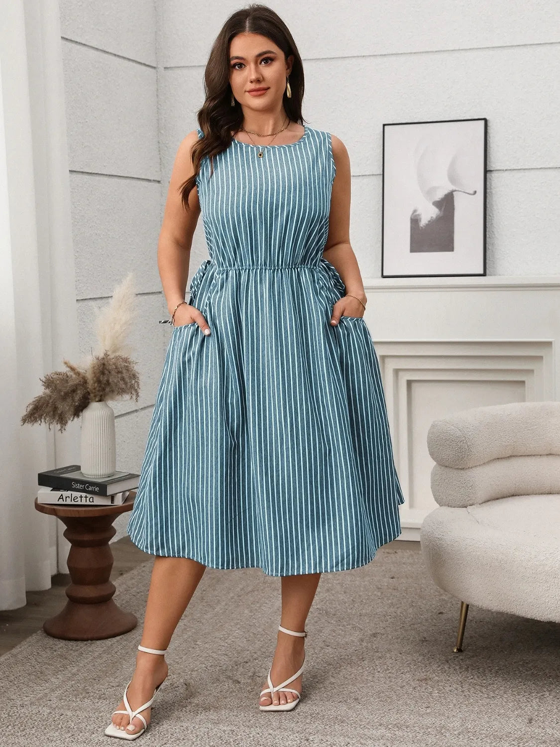 Plus Size Striped Round Neck Sleeveless Dress - Premium Dresses from Trendsi - Just $40.99! Shop now at Handbags Specialist Headquarter