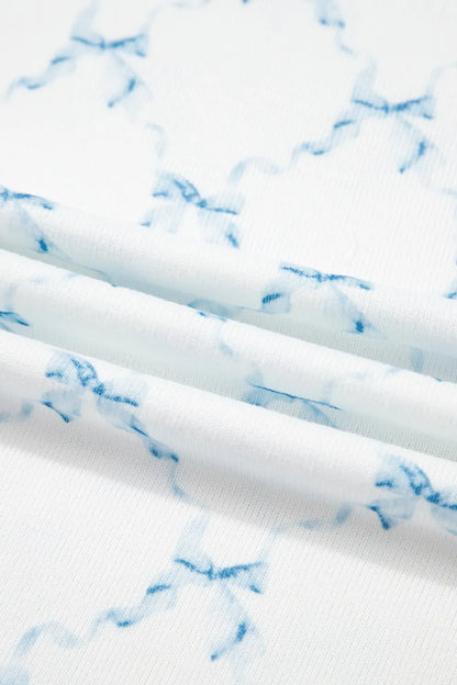 Printed Round Neck Top and Shorts Two-Piece Lounge Set - Premium Sleepwear from Trendsi - Just $39.99! Shop now at Handbags Specialist Headquarter