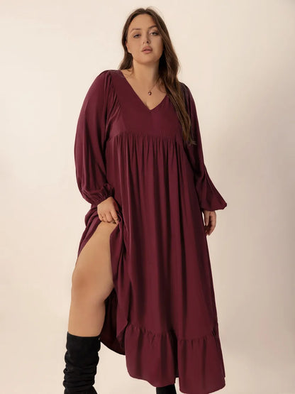Plus Size Ruffled Hem V-Neck Balloon Sleeve Dress - Premium Dresses from Trendsi - Just $38.99! Shop now at Handbags Specialist Headquarter