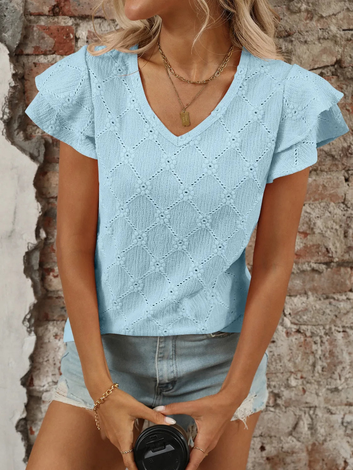 Eyelet V-Neck Ruffled Cap Sleeve Top - Premium Tops from Trendsi - Just $20.68! Shop now at Handbags Specialist Headquarter