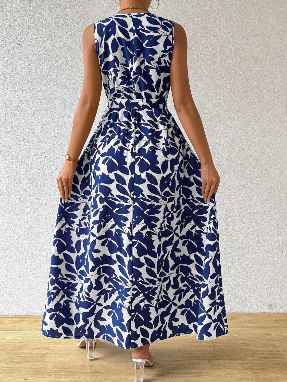 Printed Surplice Sleeveless Maxi Dress - Premium Maxi Dress from Trendsi - Just $43.99! Shop now at Handbags Specialist Headquarter