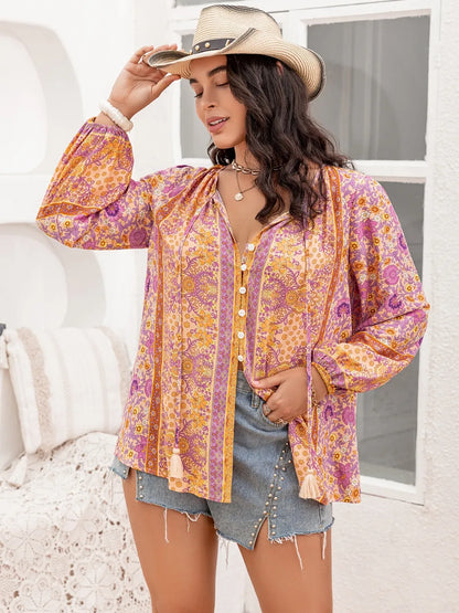 Plus Size Tie Neck Tassel Printed Blouse - Premium Plus Size Shirts from Trendsi - Just $30! Shop now at Handbags Specialist Headquarter