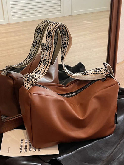 PU Leather Adjustable Strap Crossbody Bag - Premium Crossbody Bag from Trendsi - Just $26.99! Shop now at Handbags Specialist Headquarter