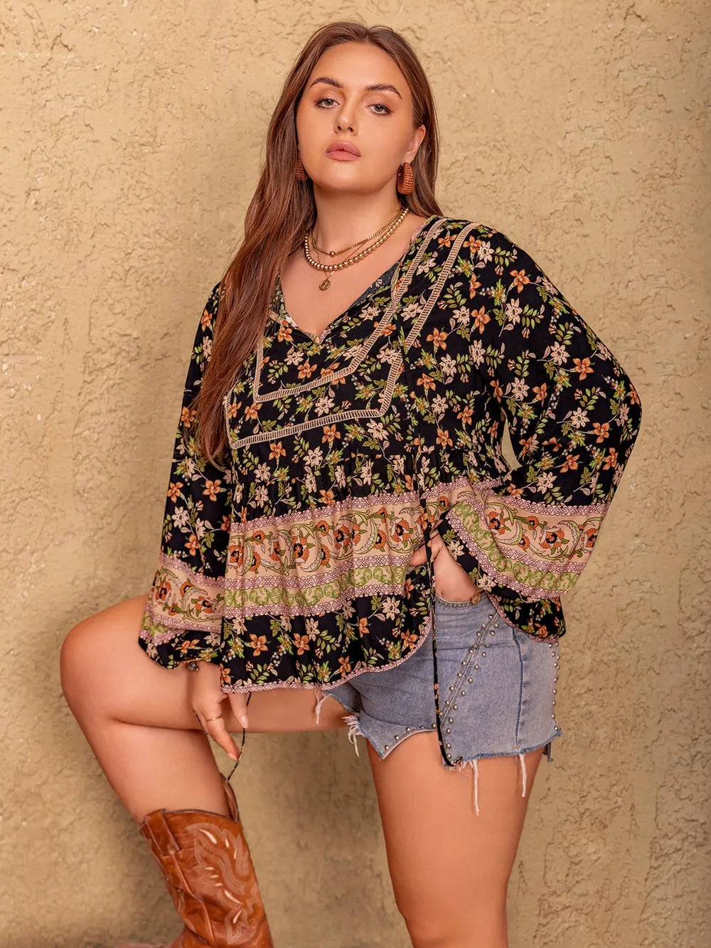 Plus Size Printed Tie Neck Balloon Sleeve Blouse - Premium Plus Size Shirts from Trendsi - Just $29.98! Shop now at Handbags Specialist Headquarter