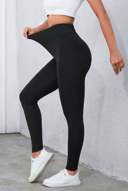 Crisscross Detail Wide Waistband Leggings - Premium Leggings from Trendsi - Just $38.19! Shop now at Handbags Specialist Headquarter