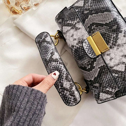 PU Leather Snakeskin Print Crossbody Bag - Premium Crossbody Bag from Trendsi - Just $35.99! Shop now at Handbags Specialist Headquarter