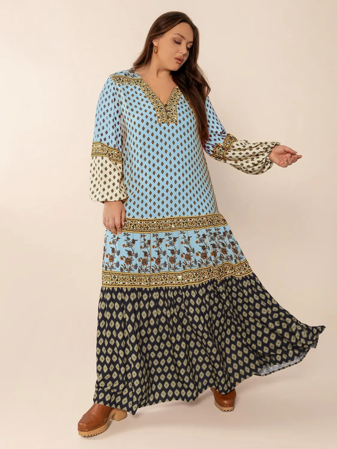 Plus Size Printed V-Neck Balloon Sleeve Maxi Dress - Premium Dresses from Trendsi - Just $52.99! Shop now at Handbags Specialist Headquarter