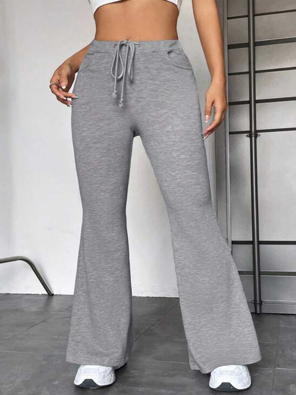 Drawstring Sweatpants with Pockets - Premium  from Trendsi - Just $47.99! Shop now at Handbags Specialist Headquarter