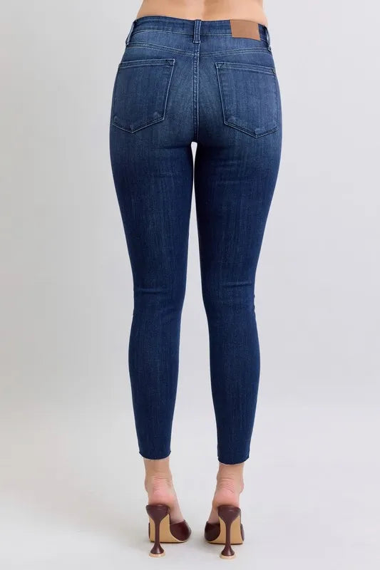 Judy Blue Full Size Mid Rise Skinny Jeans with Raw Hem Plus Size - Premium Women / Jeans & Denim from Trendsi - Just $55.99! Shop now at Handbags Specialist Headquarter