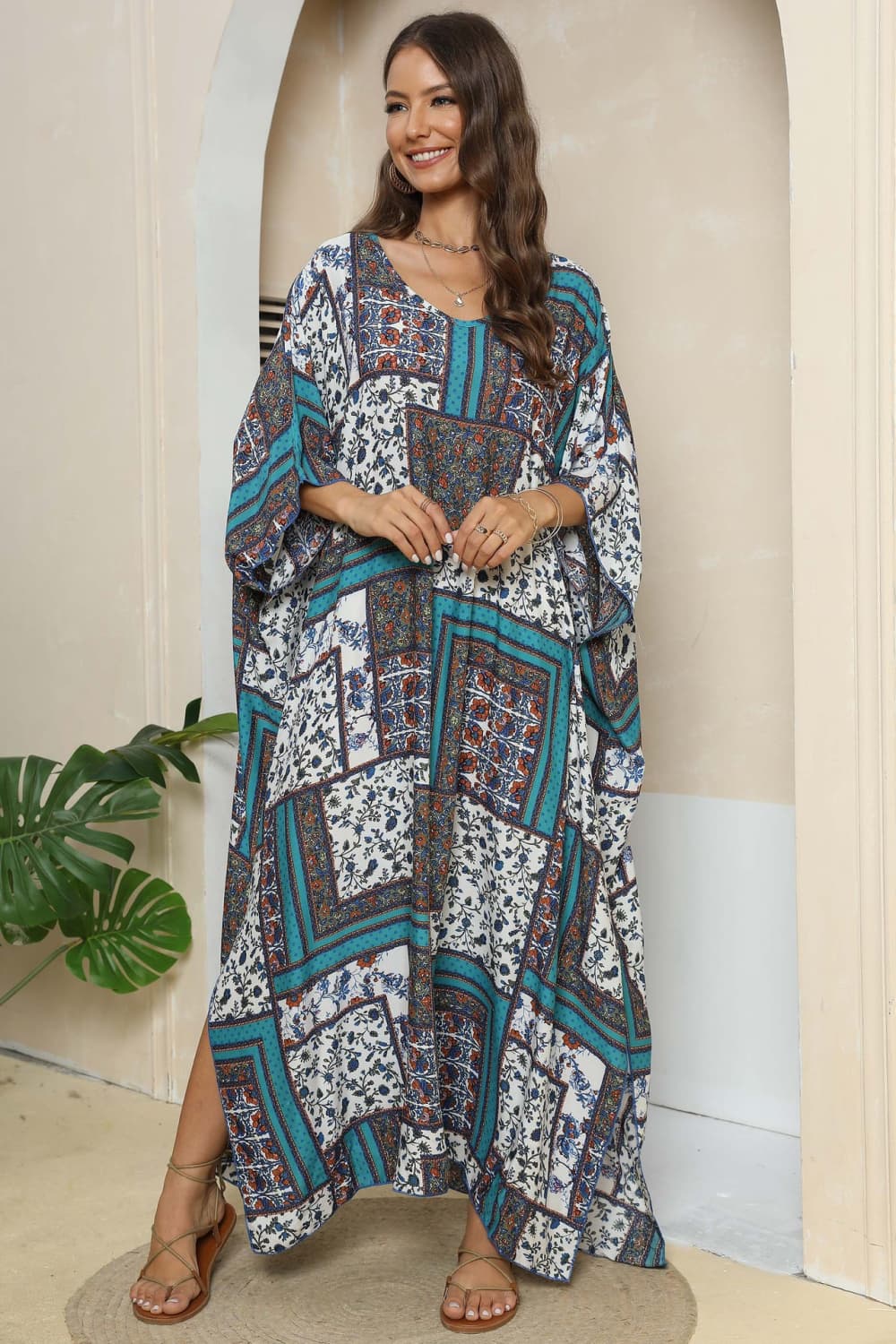Printed V-Neck Split Maxi Dress - Premium Maxi Dress from Trendsi - Just $28.99! Shop now at Handbags Specialist Headquarter
