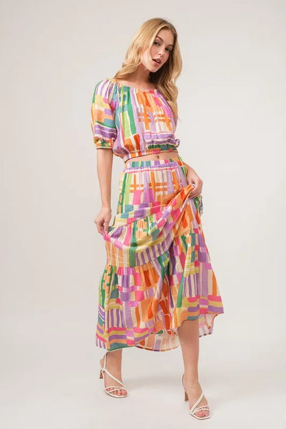 And The Why Asymmetric Geo Printed Tiered Maxi Skirt - Premium Skirts from Trendsi - Just $47.99! Shop now at Handbags Specialist Headquarter