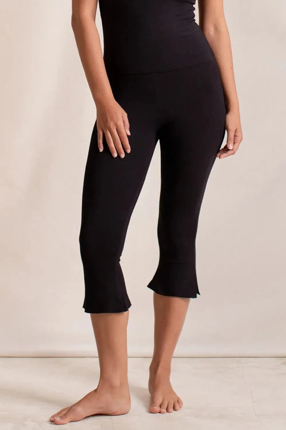 Side Slit Capris Leggings - Premium Leggings from Trendsi - Just $29.40! Shop now at Handbags Specialist Headquarter