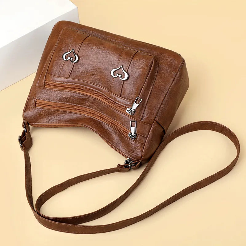 PU Leather Multi-Pockets Crossbody Bag - Premium Crossbody Bag from Trendsi - Just $27.99! Shop now at Handbags Specialist Headquarter