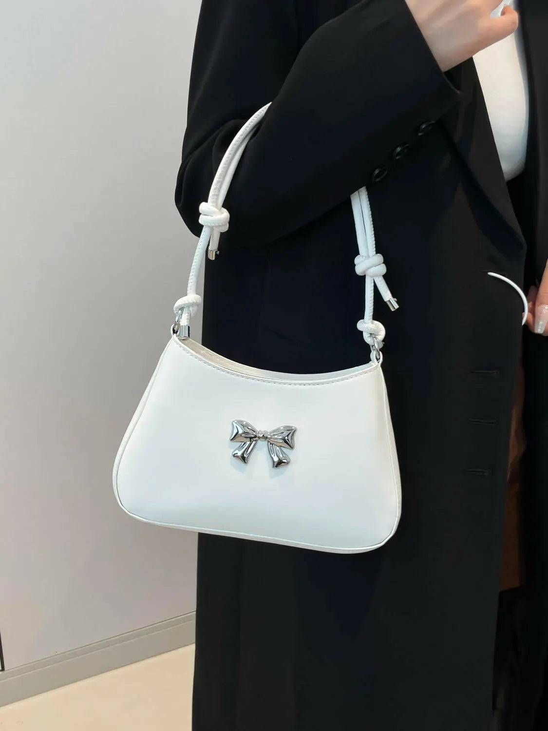 Bow PU Leather Knotted Strap Handbag.