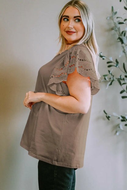 Plus Size Eyelet Round Neck Short Sleeve Blouse.