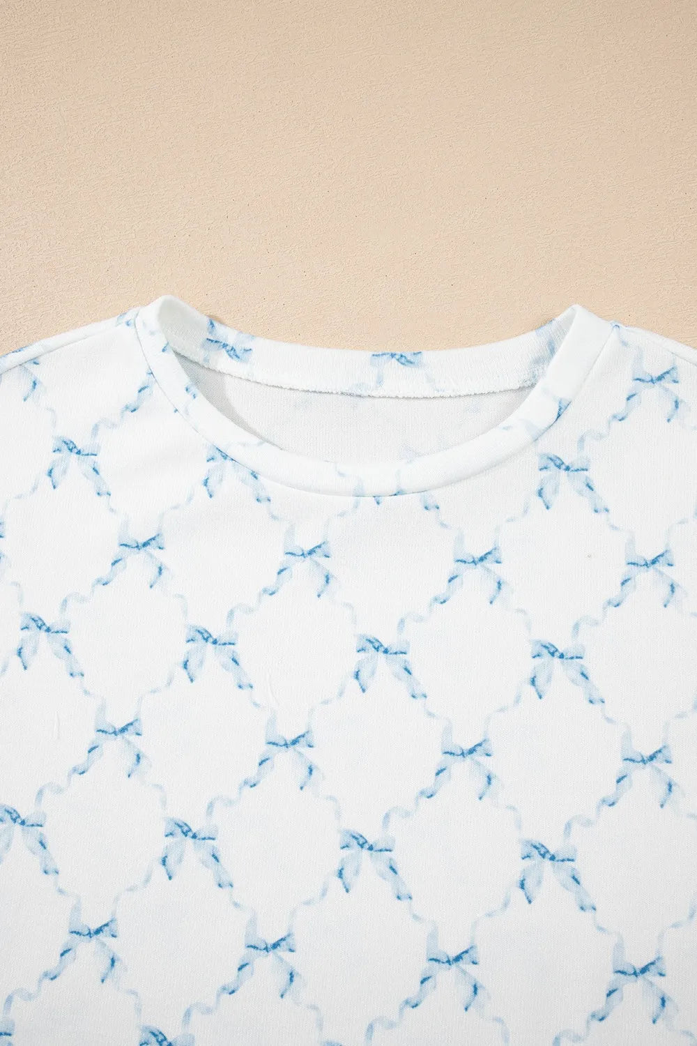 Printed Round Neck Top and Shorts Two-Piece Lounge Set - Premium Sleepwear from Trendsi - Just $39.99! Shop now at Handbags Specialist Headquarter