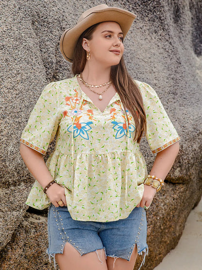 Plus Size Printed Tie Neck Half Sleeve Blouse - Premium Plus Size Shirts from Trendsi - Just $29.28! Shop now at Handbags Specialist Headquarter