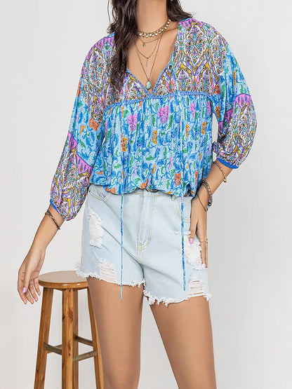 Plus Size Printed Tie Neck Balloon Sleeve Blouse - Premium Plus Size Shirts from Trendsi - Just $28! Shop now at Handbags Specialist Headquarter