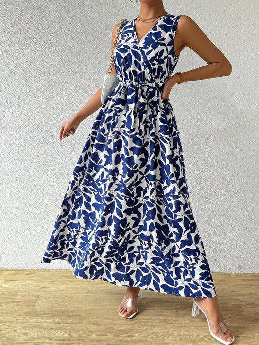Printed Surplice Sleeveless Maxi Dress - Premium Maxi Dress from Trendsi - Just $43.99! Shop now at Handbags Specialist Headquarter