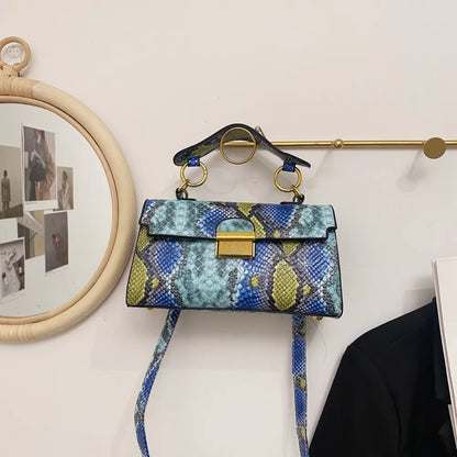 PU Leather Snakeskin Print Crossbody Bag - Premium Crossbody Bag from Trendsi - Just $35.99! Shop now at Handbags Specialist Headquarter