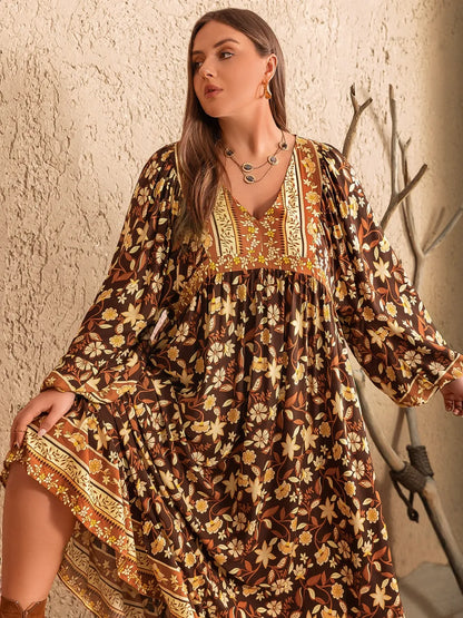 Plus Size Printed V-Neck Balloon Sleeve Dress - Premium Dresses from Trendsi - Just $49.99! Shop now at Handbags Specialist Headquarter