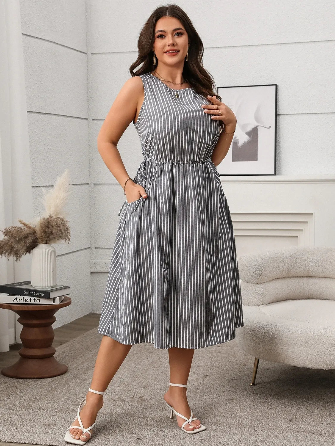 Plus Size Striped Round Neck Sleeveless Dress - Premium Dresses from Trendsi - Just $40.99! Shop now at Handbags Specialist Headquarter