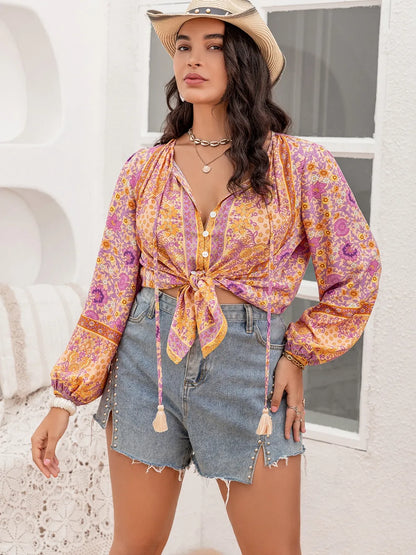 Plus Size Tie Neck Tassel Printed Blouse - Premium Plus Size Shirts from Trendsi - Just $30! Shop now at Handbags Specialist Headquarter