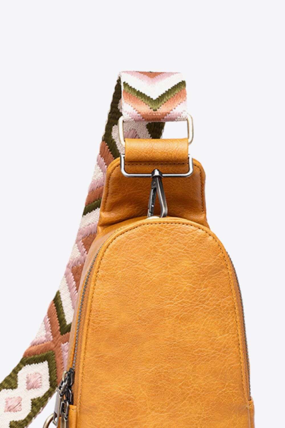 Random Pattern Adjustable Strap PU Leather Sling Bag - Premium Crossbody Bag from Trendsi - Just $32.99! Shop now at Handbags Specialist Headquarter